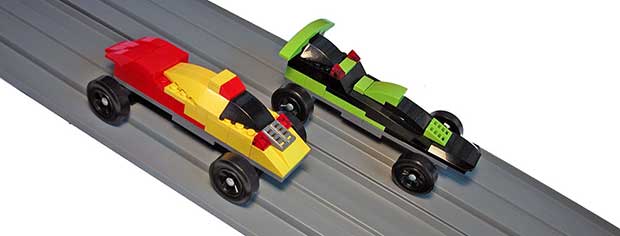 Lego cars on pinewood derby track